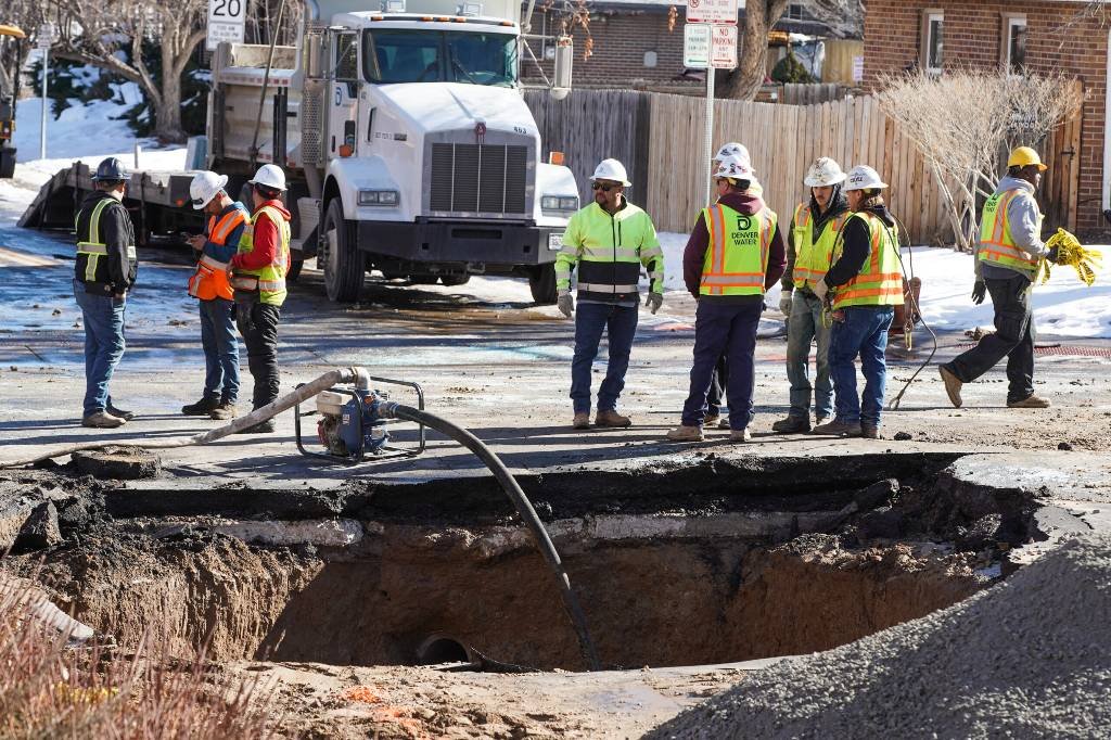 Article image for A water line break opened a massive hole at E. 9th Avenue and Eudora Street