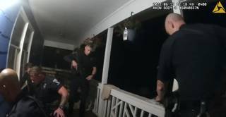 Article image for Police video shows ambulance delay in arrest of Charlotte man in medical distress