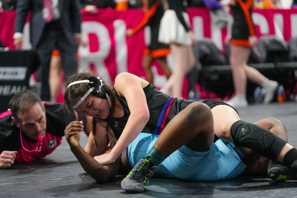 Article image for Stories from first-year wrestlers who qualified for the first IGHSAU girls state tournament