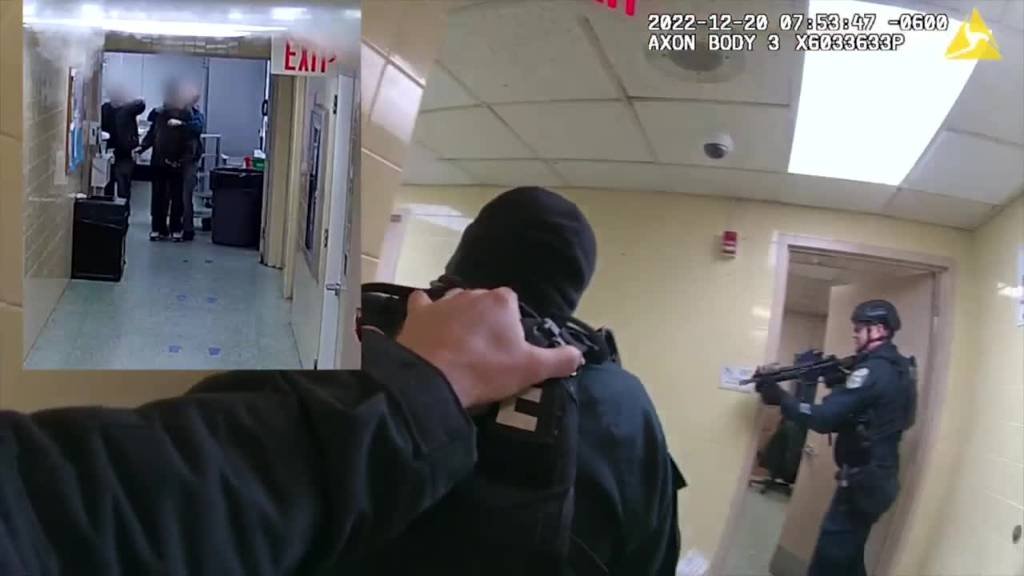 Article image for Body cam footage released: Officer fatally shoots armed suspect inside Vets Place Center